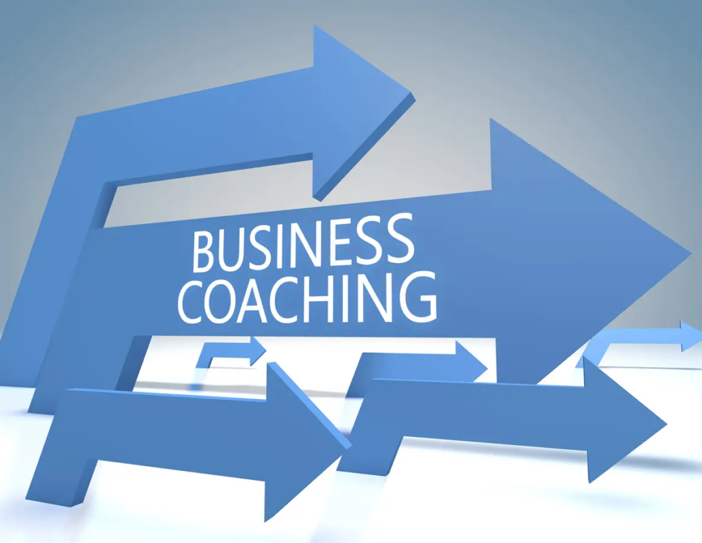 Coaching business | Two arrows on blue background with the words "business coaching" written across.
